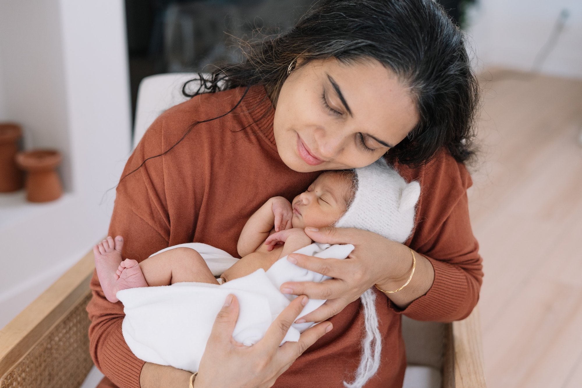 Peaceful newborn baby sleeping portrait by Sara Mendonca